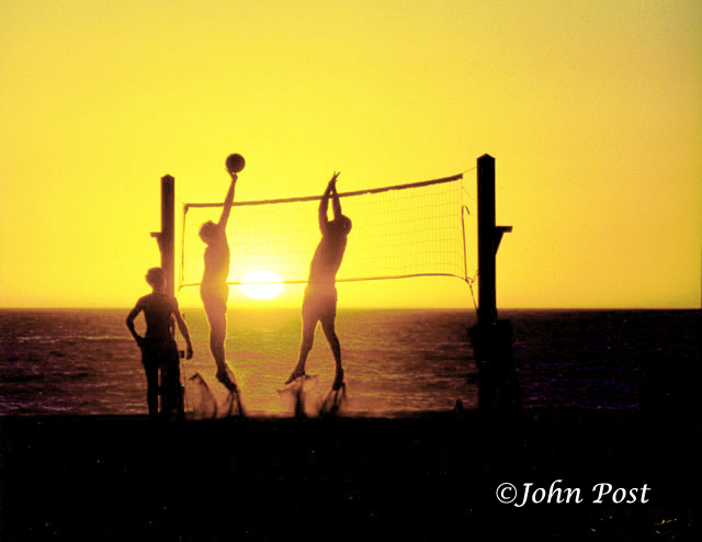 Beach Volleyball Game at Sunset in Hermosa Beach, CA