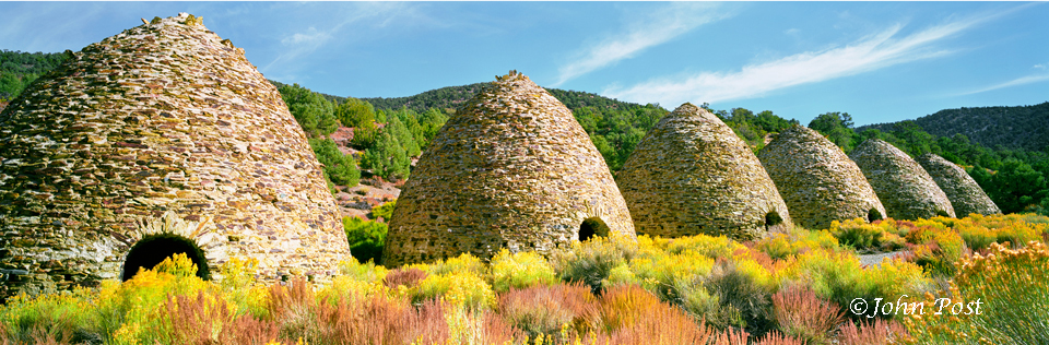 Row of conical charcoal kilns from the 1880s.