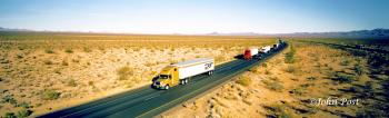Highway Line of Trucks on Interstate