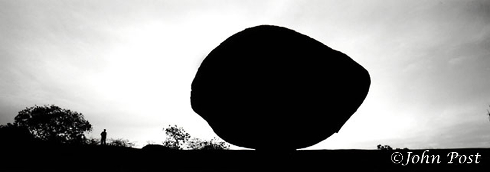 Silhouette of giant round rock