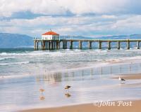 ShoreBirds Clouds Pier and Mountains