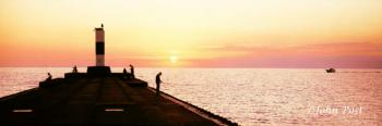 Fishing on Lake Michigan at Sunset