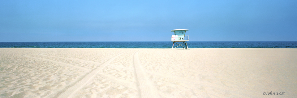 Lifeguard tower on beach, clear sky