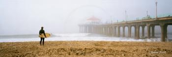 Surfer and Manhattan Pier in Fog