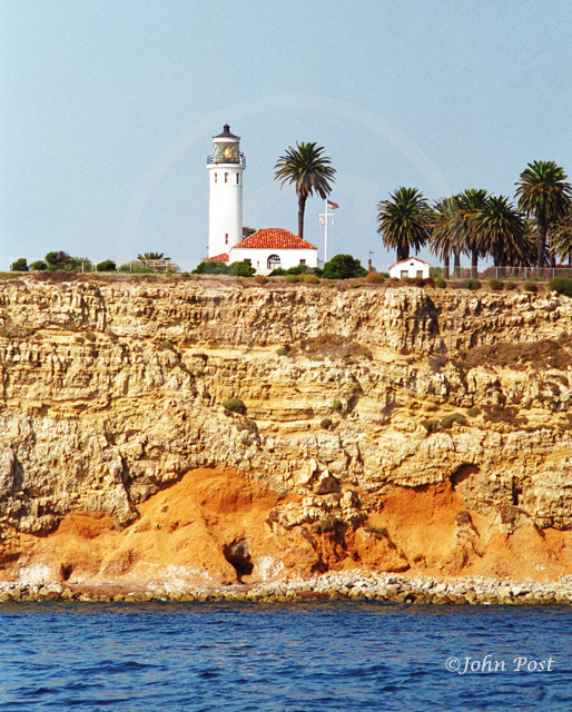 Pt Vicente Lighthouse and crashing wave