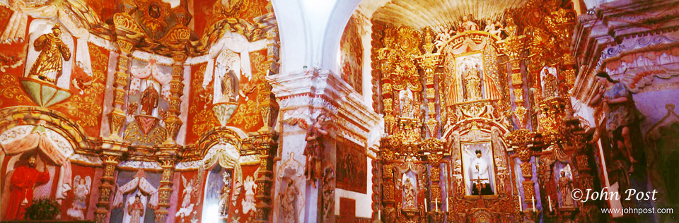 view of church interior, main alter and side chapels