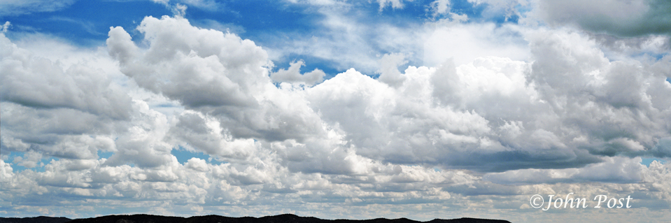 Storm clouds in sky over mountain