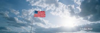 American Flag Stars and Stripes Clouds Wind Sun